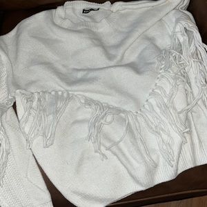 Sweater with tassels